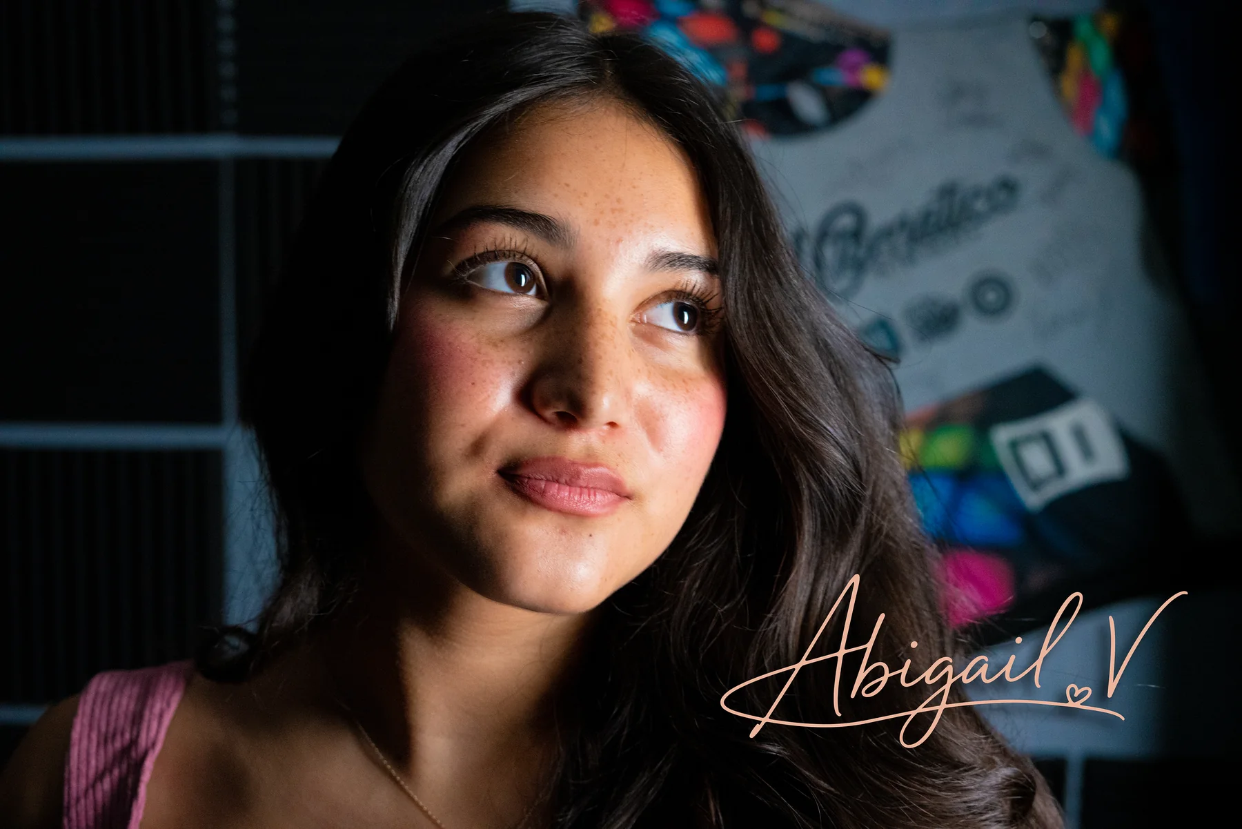Editorial portrait of Abigail V. in warm low light